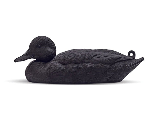 Black duck decoy on a white background