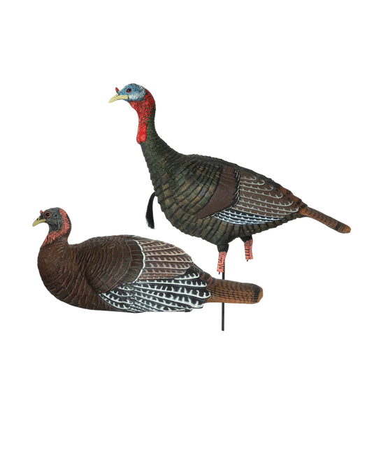 Two turkey decoys on a white background