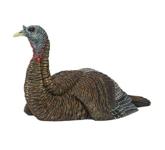 Decoy turkey against a white backdrop